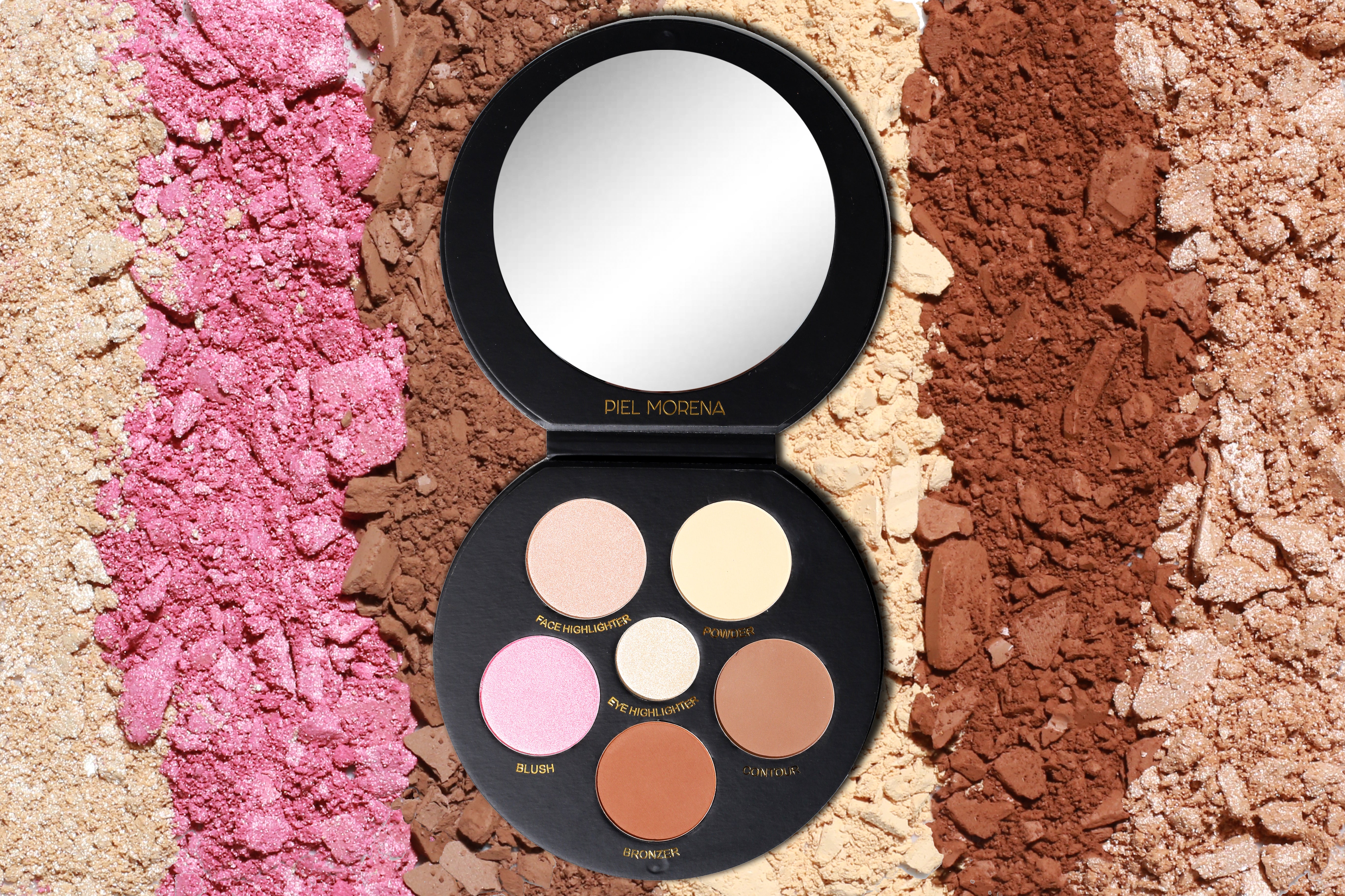 Open Piel Morena makeup palette surrounded by fields of crushed pigment
